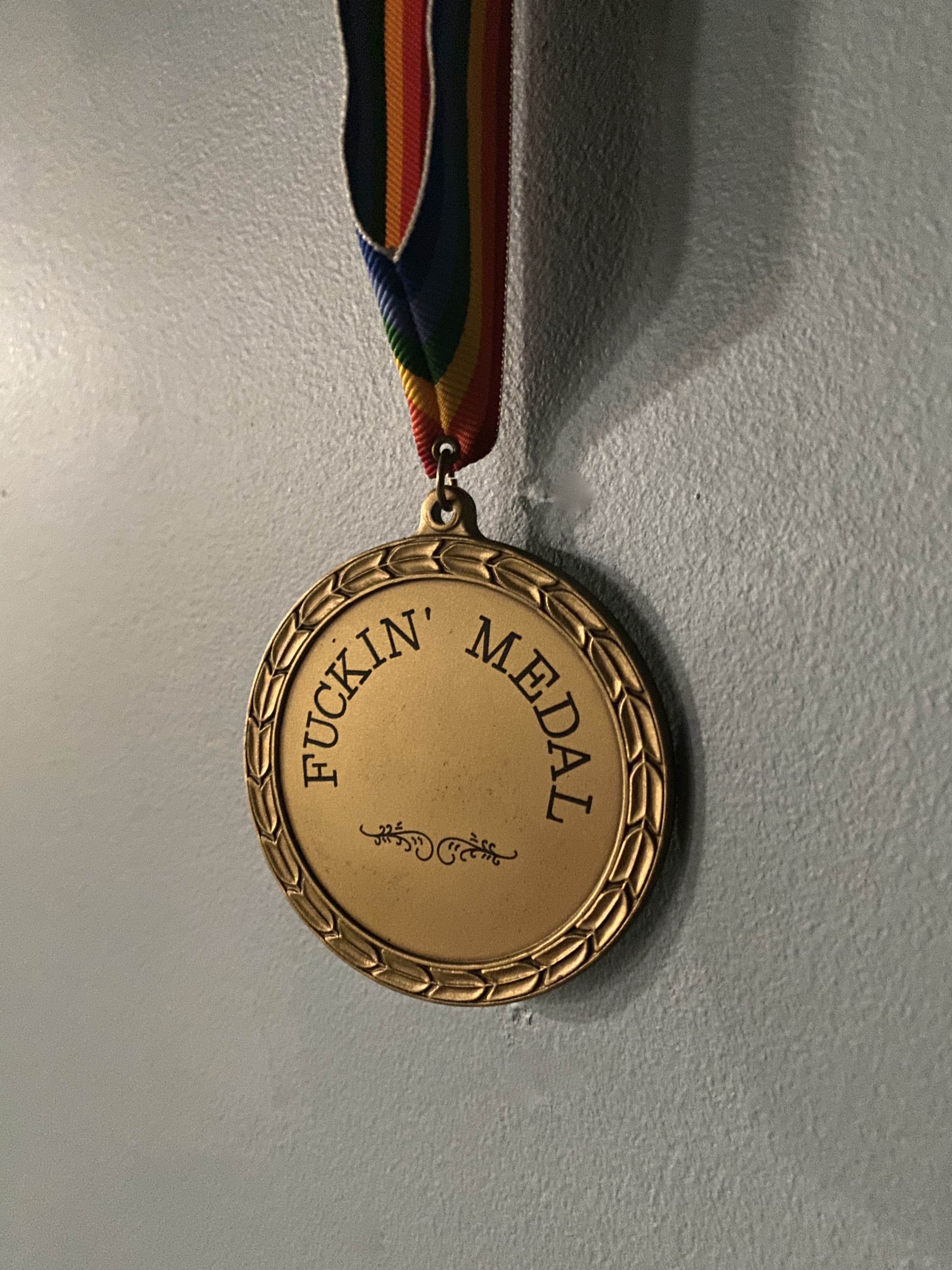 The medal on the wall of Glenn Reid's office